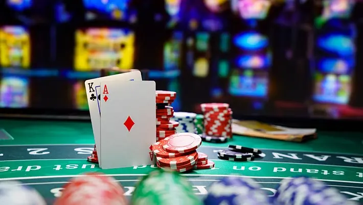 Blackjack hand and a stack of chips 