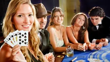 gamblers sitting around a casino table