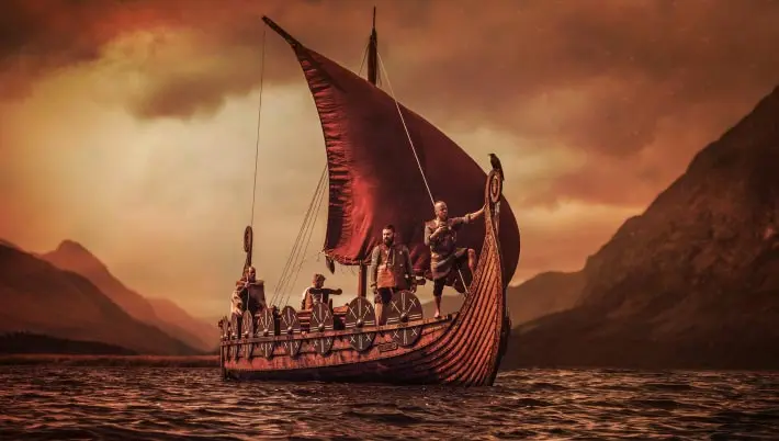 Viking ship with Viking warriors standing on the deck 