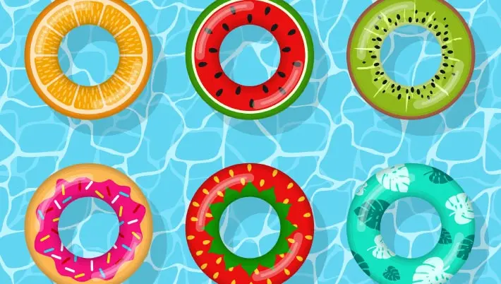 fruit candy rings floating in a pool