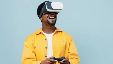 a man enjoying gaming using a VR unit
