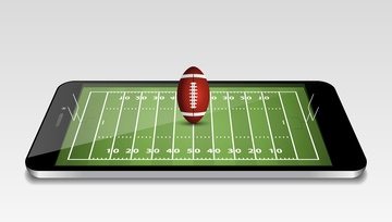 a mobile phone with an American football field on the screen and an American football