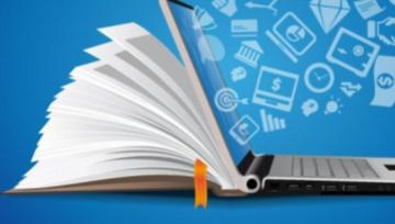 a book and laptop merged into one device with symbols pouring forth from the laptop.