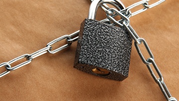 a box with chains and a lock on it