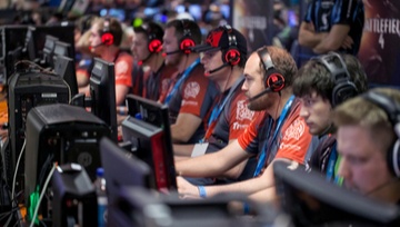 Gamers playing at an esports tournament
