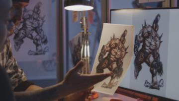 two game developers working on the graphics of a new game